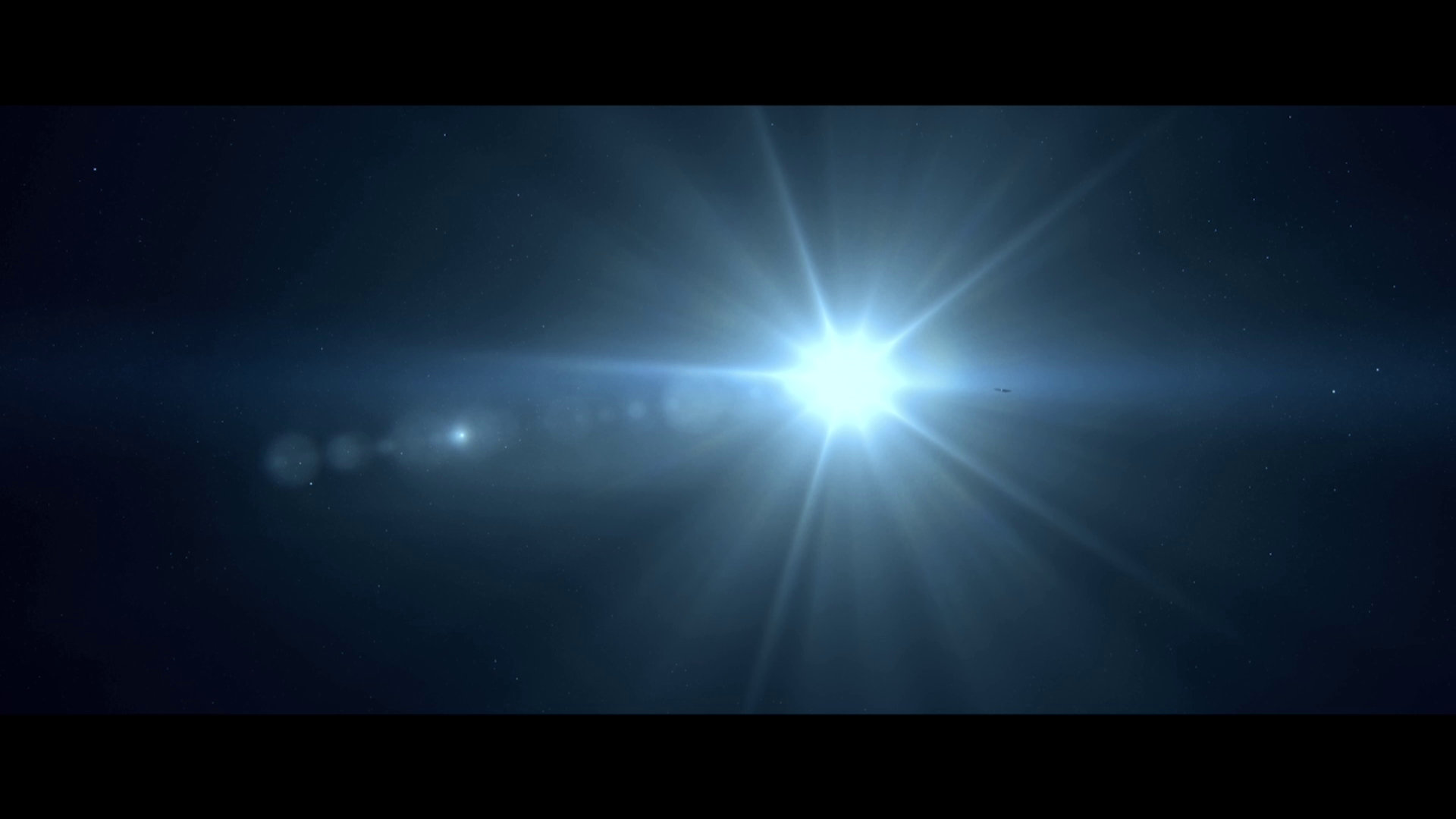 In the Year 5,981,407, somewhere in the Lyra constellation, we are almost blinded by a brilliant star with a much dimmer shining object near it. Nearly lost in the glare is a small, dark, and very silent spaceship drifting towards one of this system’s exoplanets.