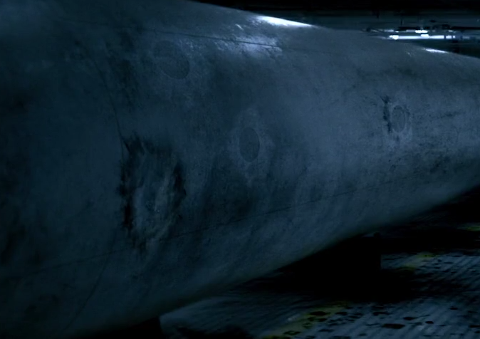 The “emergency fuel probe” that the people of the Aniara had once put so much hope in sits alone in the ship’s dimly lit holding bay, unopened and still mysterious. The probe bears the scars of the crew’s failed efforts to wrest its secrets.